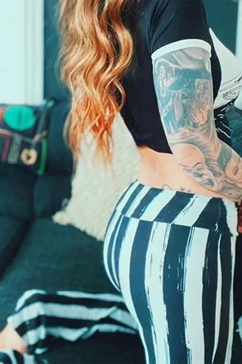 Distressed Black & White Striped Beetlejuice Fl  are Pants